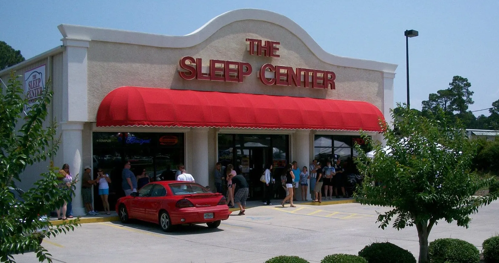 The Sleep Center storefront with its red canopy on W. 23rd Street in Panama City