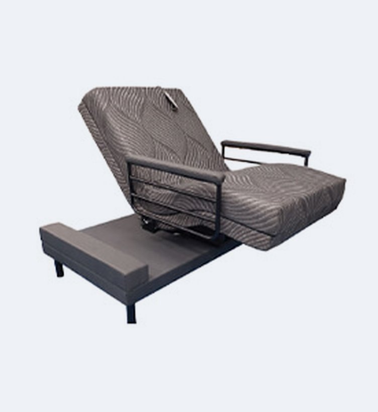 Independence Bed rotated to a seated position with side rails