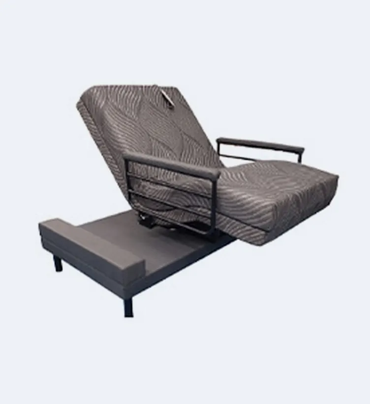 Independence Bed rotated to a seated position with side rails