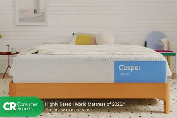 Casper Dream hybrid mattress on a wood bed frame