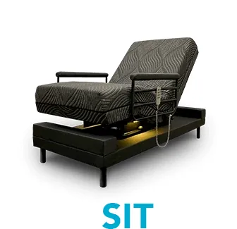 Independence Bed raised to the sit position with arm rails